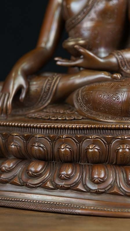 Tibetan Shakyamuni Buddha Statue in copper with mineral pigments, representing peace and wisdom, handcrafted for spiritual reflection and mindfulness.