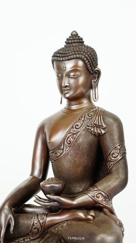 Tibetan Shakyamuni Buddha Statue in copper with mineral pigments, representing peace and wisdom, handcrafted for spiritual reflection and mindfulness.