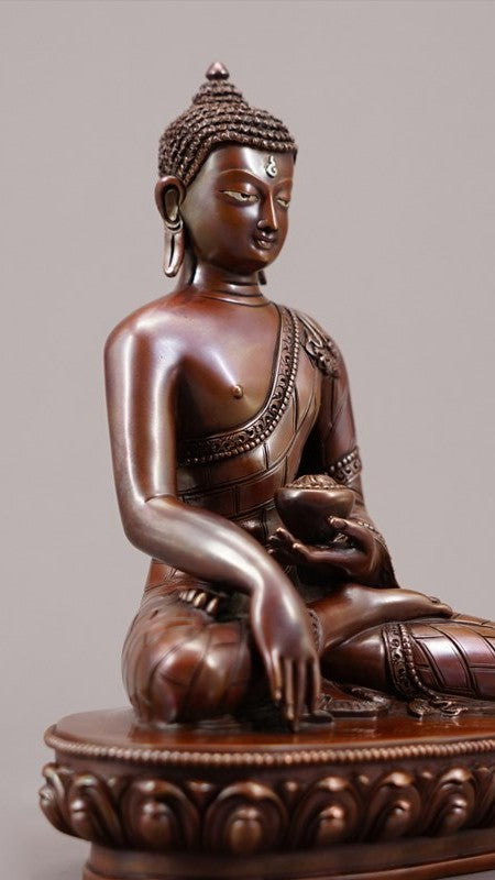 Handmade Tibetan Shakyamuni Buddha Statue in copper with mineral pigments, symbolizing wisdom and mindfulness – A serene piece for your shrine or meditation space.