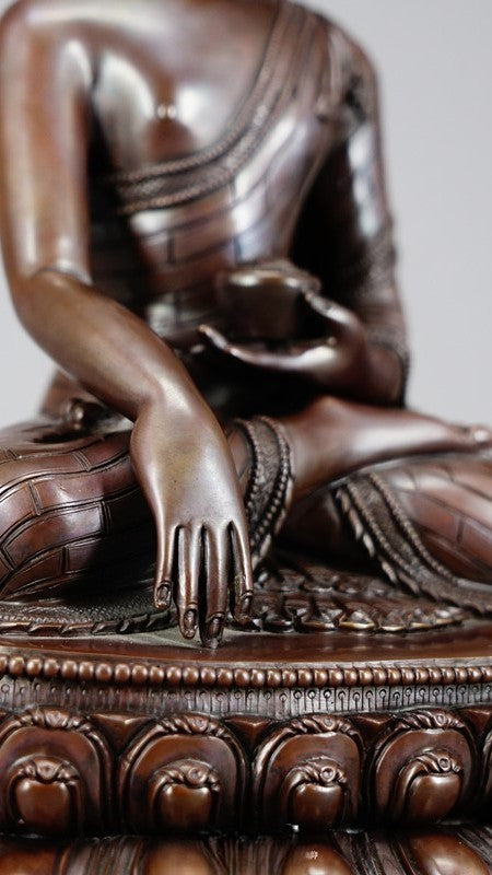 Tibetan Shakyamuni Buddha Statue in copper with mineral pigments, representing peace and wisdom, handcrafted for spiritual reflection and mindfulness.