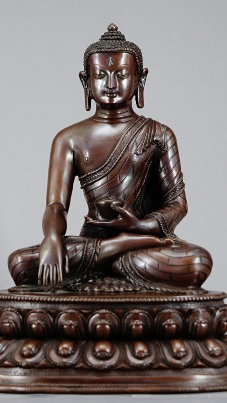Handmade Tibetan Shakyamuni Buddha Statue in copper with mineral pigments, symbolizing wisdom, compassion, and spiritual enlightenment. Ideal for meditation spaces.