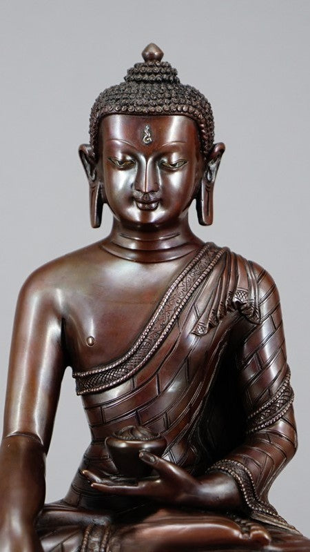 Handcrafted Tibetan Shakyamuni Buddha Statue, made from copper and mineral pigments, symbolizing enlightenment, ideal for your home or meditation space.