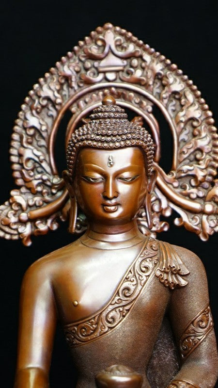 Handcrafted Tibetan Shakyamuni Buddha Statue made of copper and mineral pigments, symbolizing enlightenment and compassion, perfect for your meditation practice.