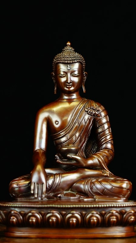 Tibetan Buddhist Shakyamuni Buddha statue in copper with mineral pigment detailing. A unique work of art that brings peace and positive energy to your home.