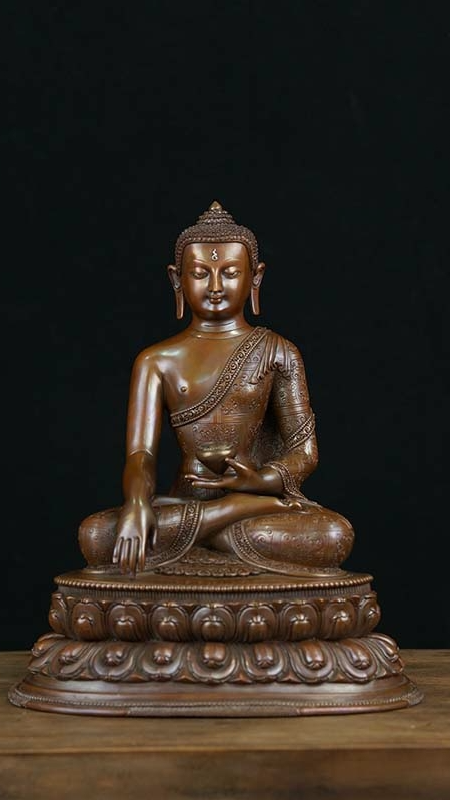 Shakyamuni Buddha Statue made of copper and mineral pigments, handcrafted with care, perfect for enhancing your meditation or spiritual practice space.