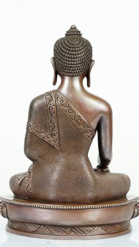 Shakyamuni Buddha Statue made of copper and mineral pigments, handcrafted with care, perfect for enhancing your meditation or spiritual practice space.
