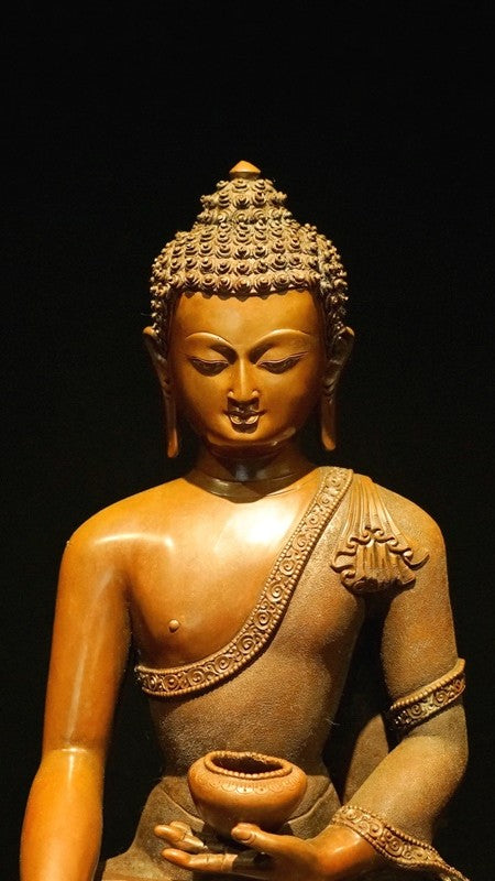 Beautiful handcrafted Shakyamuni Buddha statue in bronze with vibrant mineral paints, representing peace and wisdom in Tibetan Buddhist tradition.