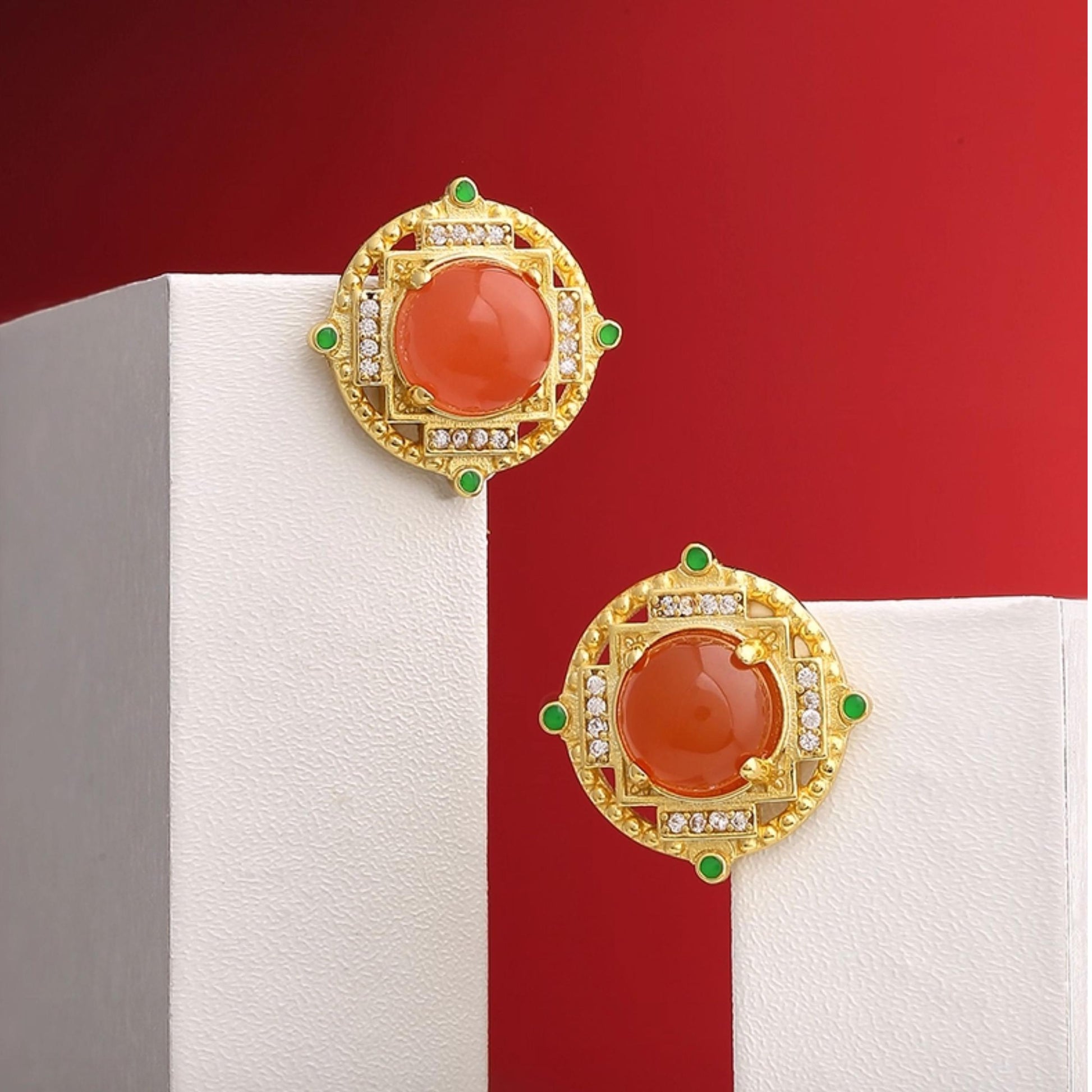 "Artisan-crafted 925 silver Sheng Le Chang Huan ear studs featuring South Red Coral, symbolizing eternal joy and spiritual fulfillment."