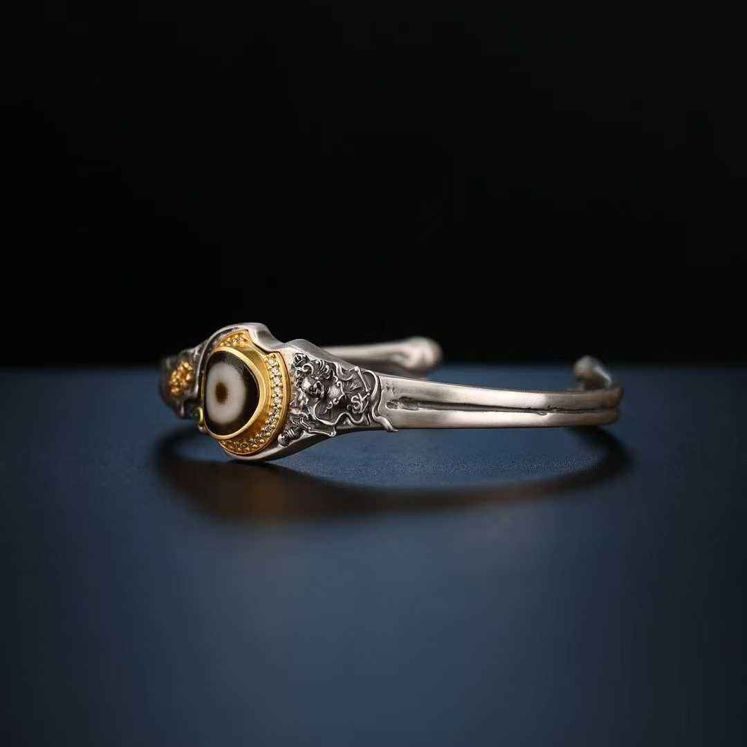 Tibetan Buddhist Shitala Master bracelet, silver inlaid, sacred symbol of protection and healing.