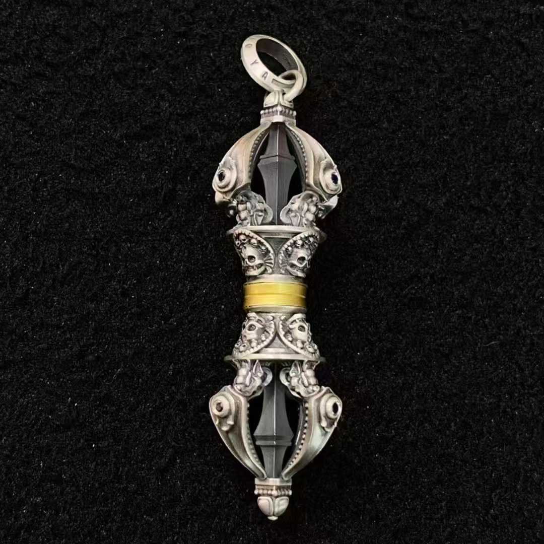 Handmade Tibetan-Buddhist cremation-ground Vajra pendant in sterling silver.