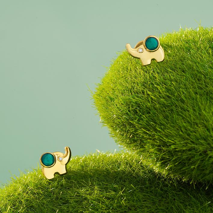 Sterling silver Tibetan earrings designed with zircon stones, symbolizing insight and purity.
