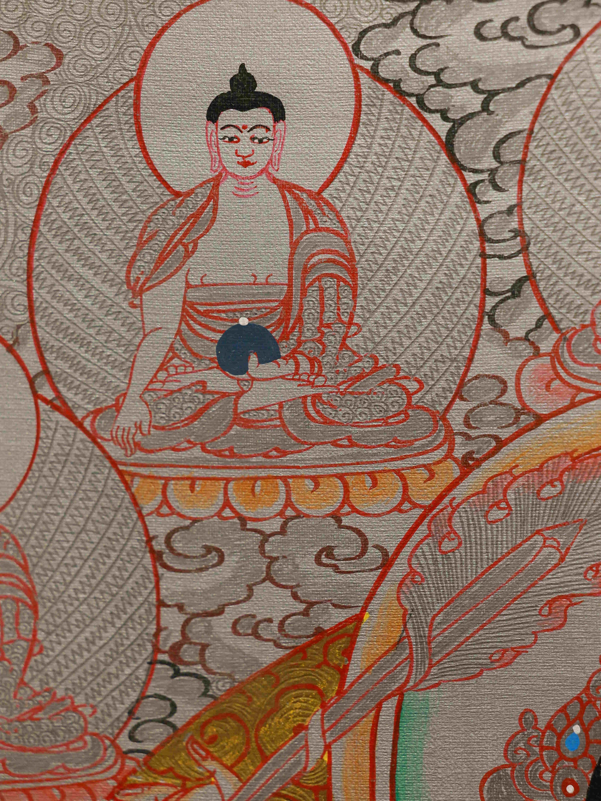 Handmade Silver Foil Manjushri Thangka art with traditional Tibetan techniques.