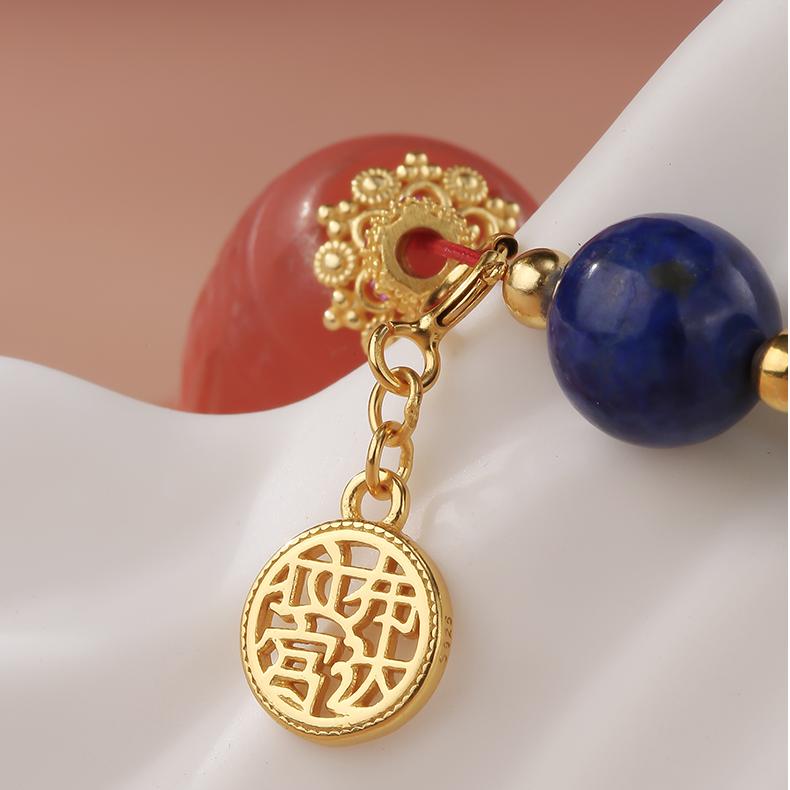 Luxury handcrafted Red Agate and Lapis Lazuli amulet necklace symbolizing energy, wisdom, and good fortune.