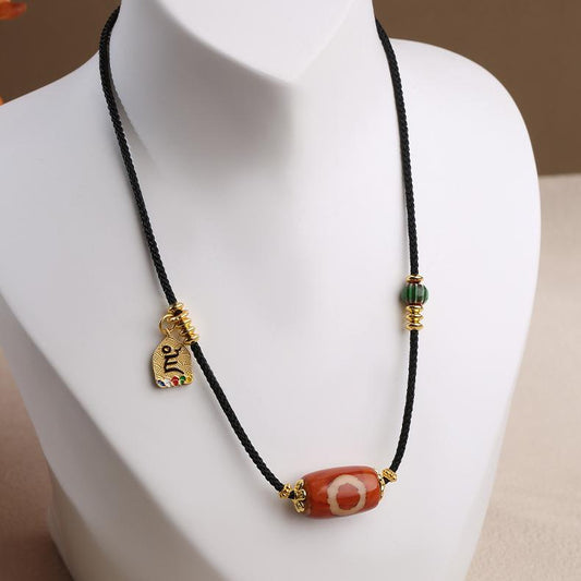 Adjustable 72cm Tibetan mala necklace with a powerful One-Eye Dzi charm, a perfect spiritual gift.