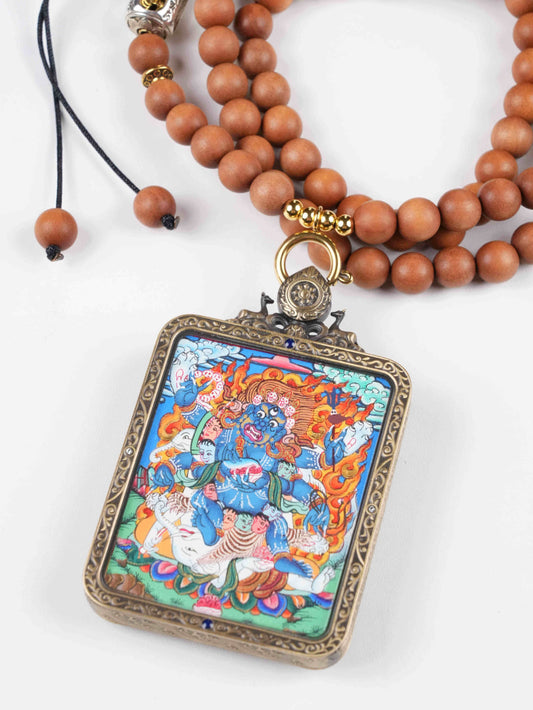 Hand-painted Six-Armed Mahakala Tibetan Thangka Gau pendant symbolizing protection and wisdom.