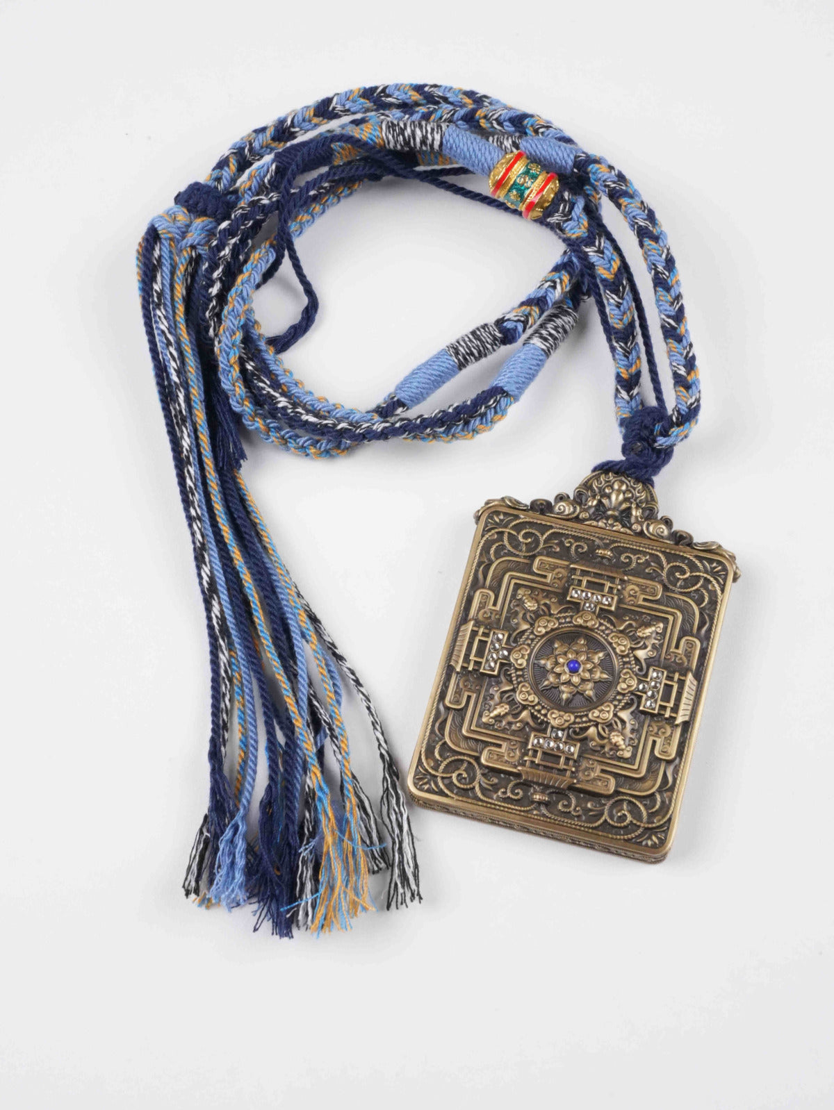 Tibetan Buddhist Thangka Gau pendant depicting Six-Armed Mahakala for wisdom and protection.