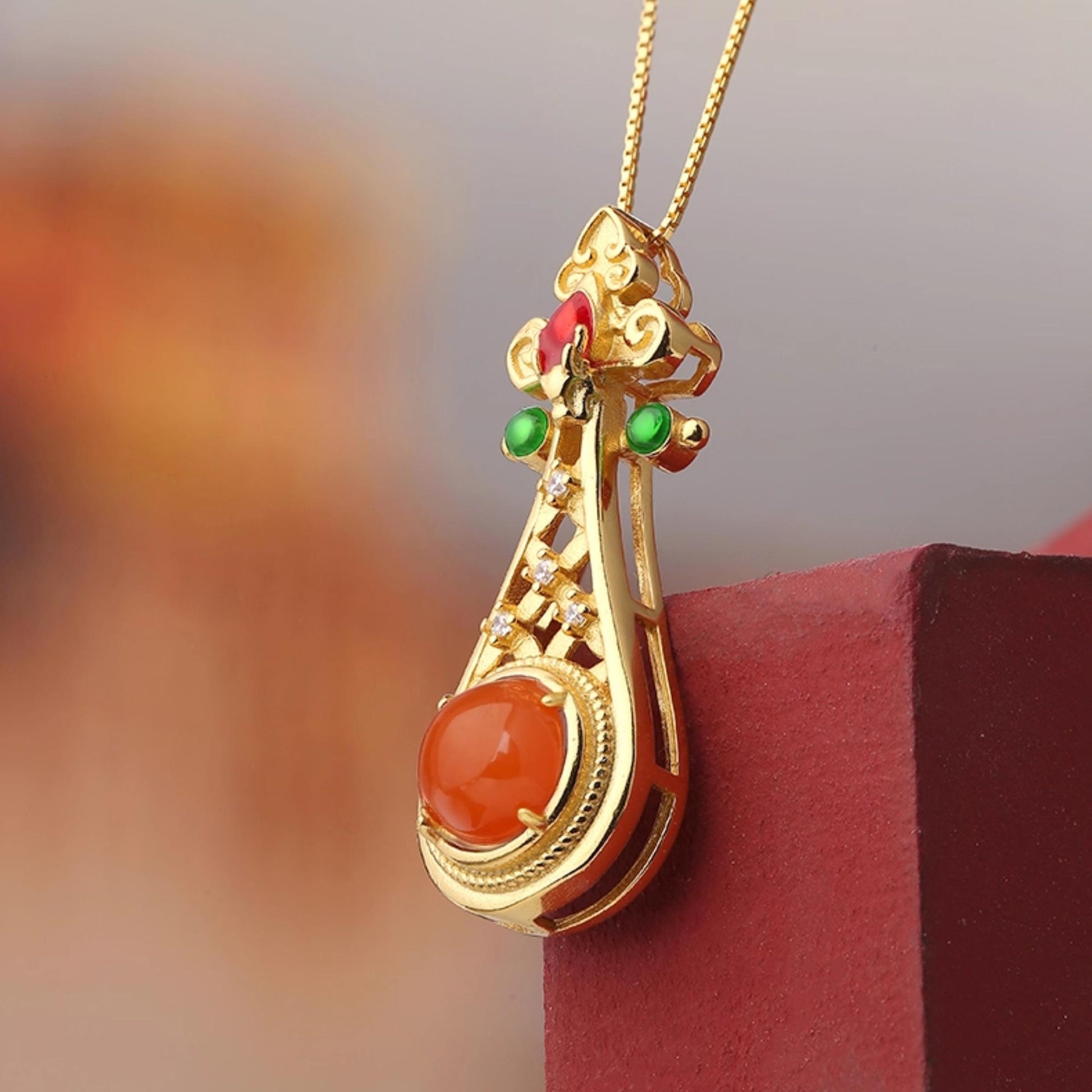 Handmade Tibetan Buddhist 925 silver pendant with South Red Agate symbolizing joy and timeless love.