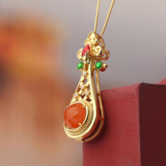 Handmade Tibetan Buddhist 925 silver pendant with South Red Agate symbolizing joy and timeless love.