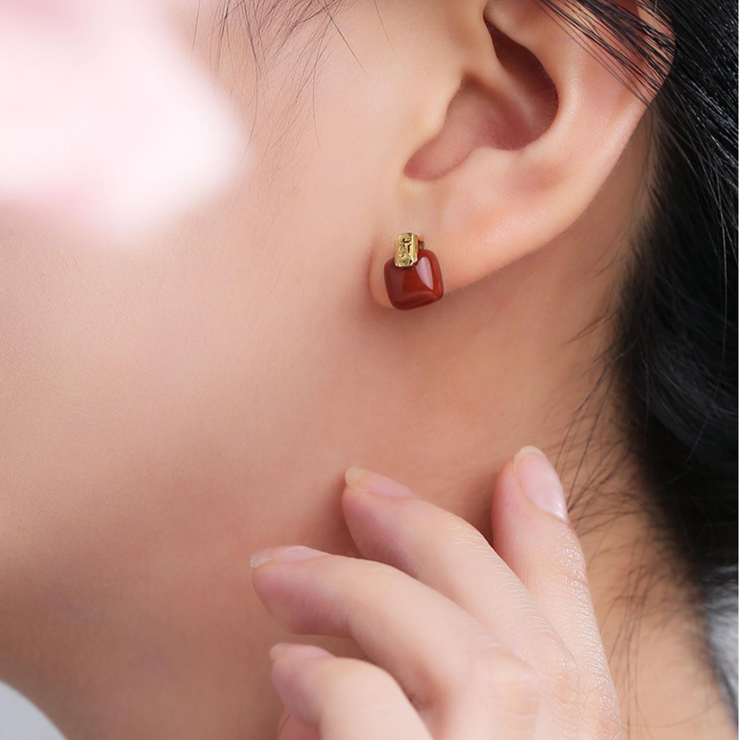 "Tibetan Buddhist South Red Coral earrings with 925 silver, featuring traditional craftsmanship and deep spiritual meaning."