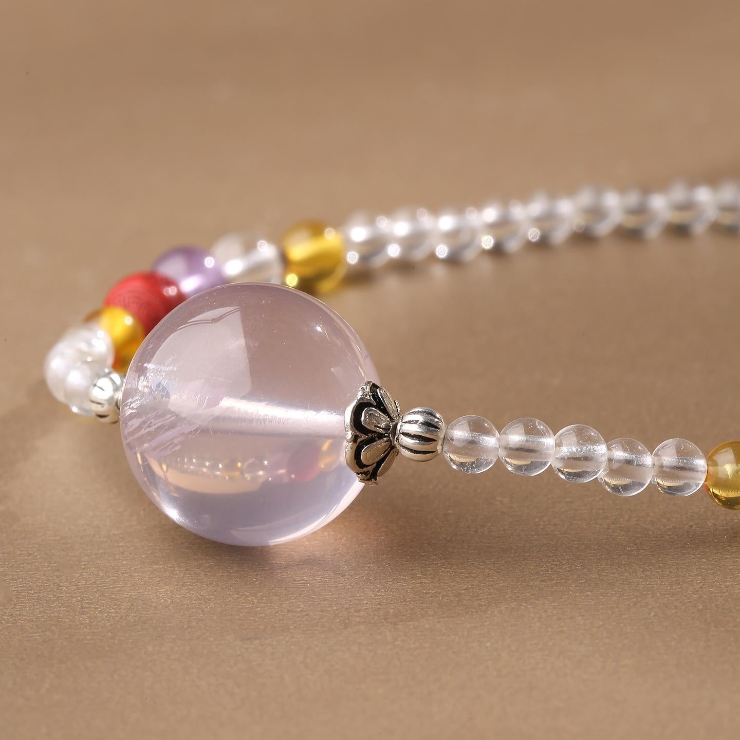 Meditation necklace with cinnabar and crystal beads for focus and serenity.