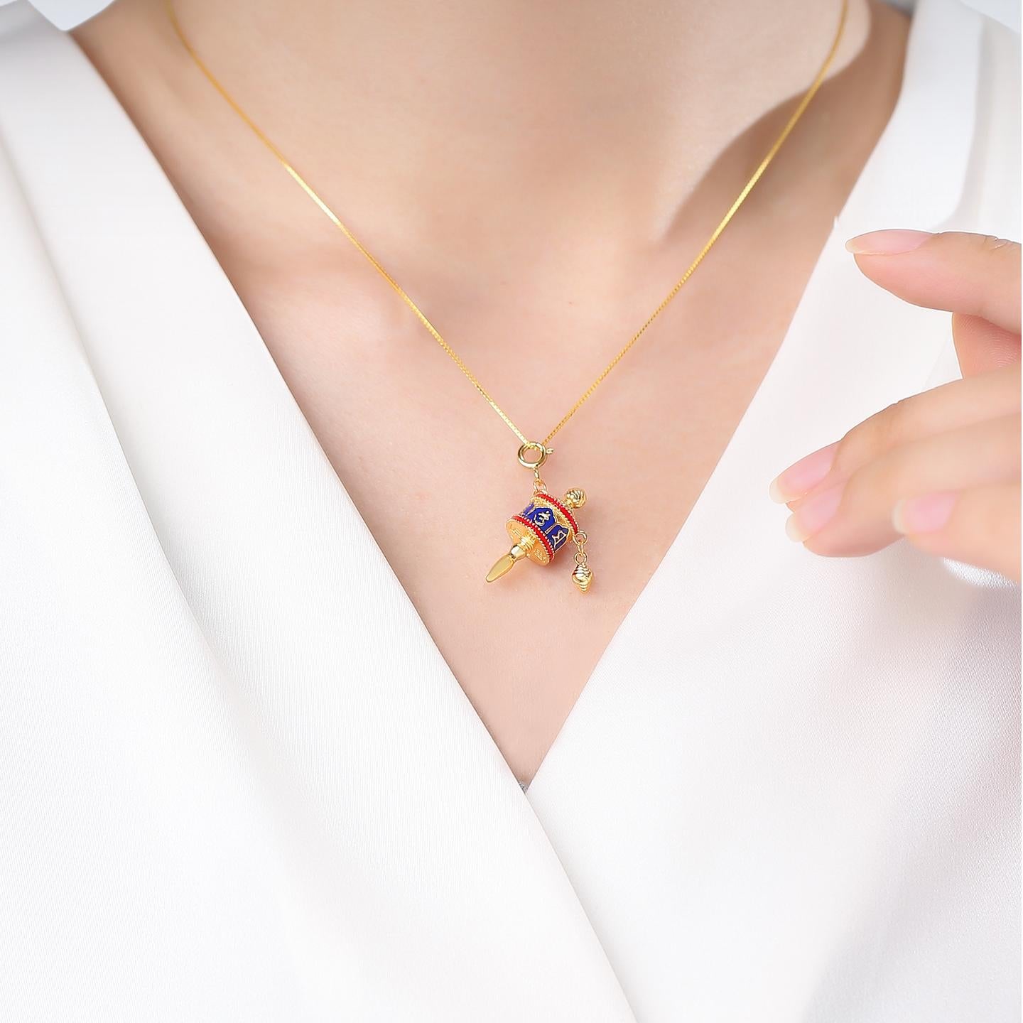 Elegant enamel Sanskrit pendant symbolizing harmony and devotion.