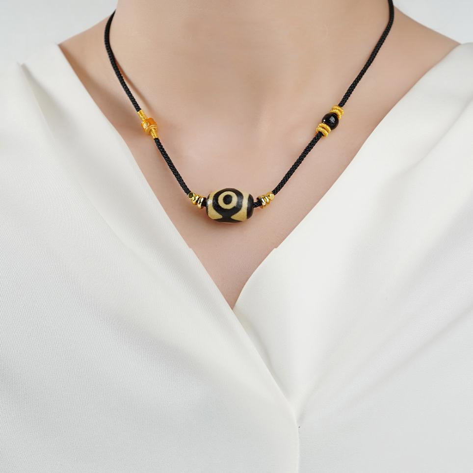 Tibetan Buddhist Three-Eye Dzi Necklace – traditional agate amulet for prosperity and good fortune