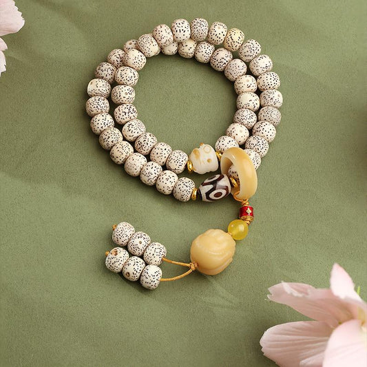 Handmade Tibetan Buddhist star-moon Bodhi bracelet with agate and copper accents, inspired by Tibetan thangka art.