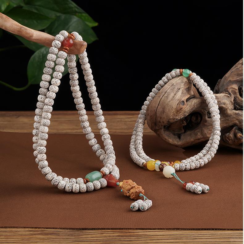 Handcrafted Tibetan Buddhist meditation necklace made from star-moon Bodhi, chalcedony, agate, and mantra beads.