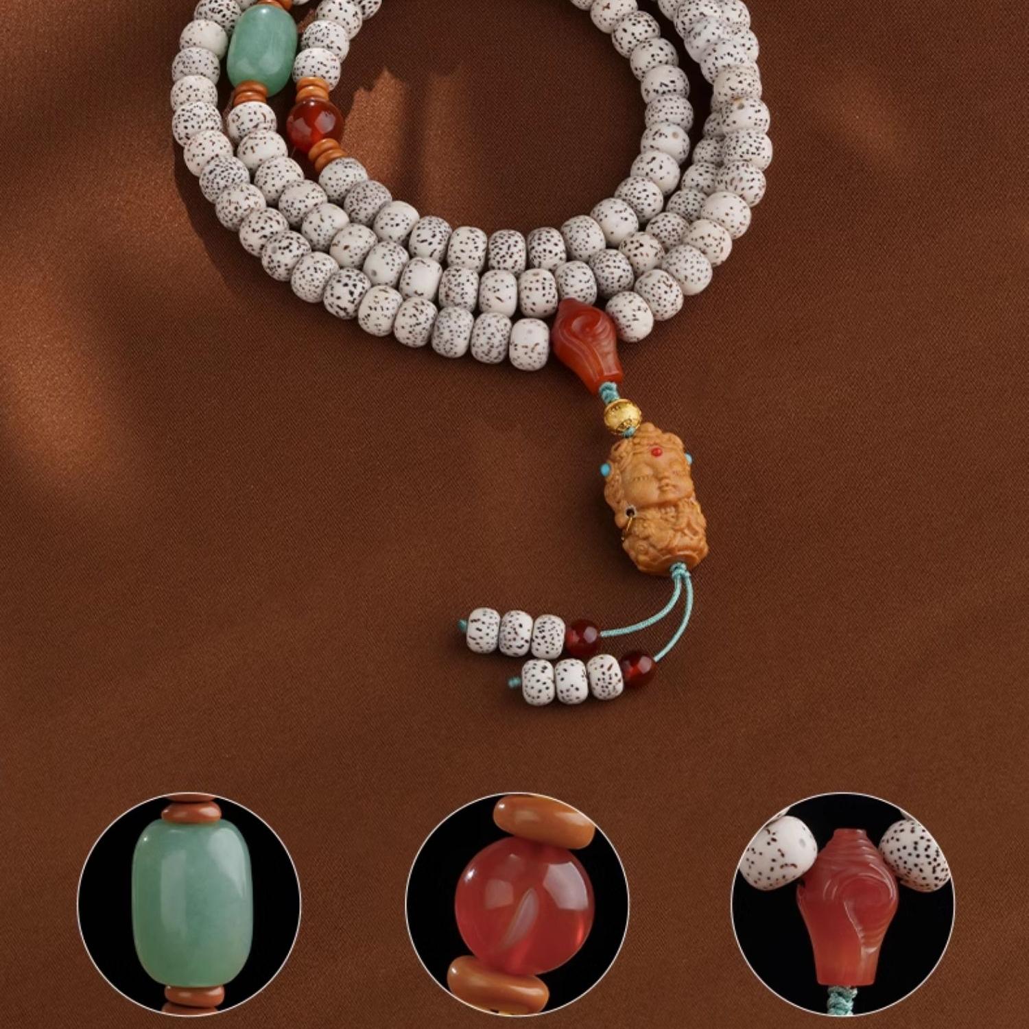 Handcrafted Tibetan Buddhist bodhi mala featuring agate beads silver mantra bead and olive nut.