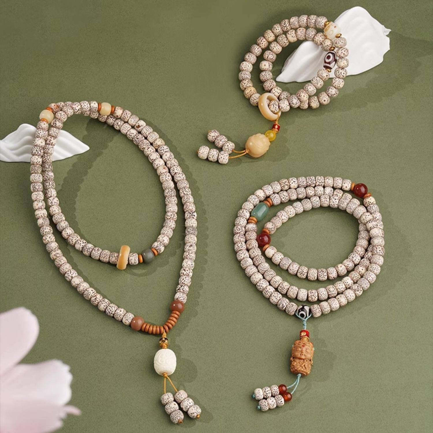 Handcrafted Tibetan Bodhi mala with 108 beads, featuring Barbidan, chalcedony and agate details in Xiangxie spiritual jewelry style.