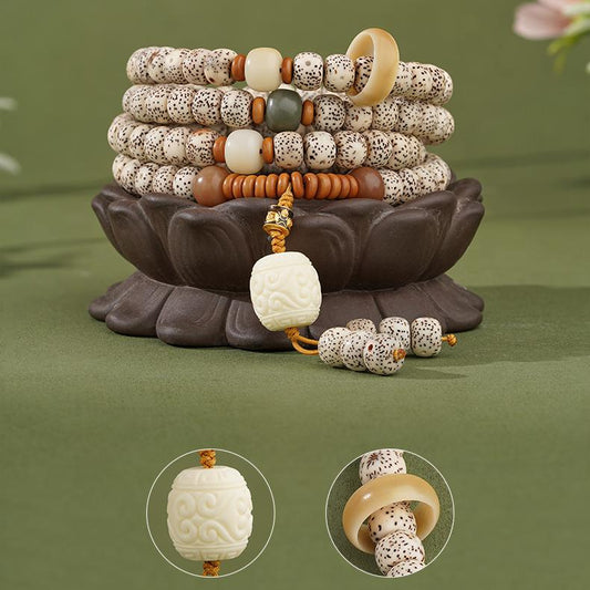 Handmade Tibetan Buddhist Starry Moon Bodhi 108 mala with olive nut and copper beads, inspired by Tibetan thangka artistry.