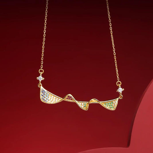 Handmade Tibetan Buddhist Ruyi pendant in 925 sterling silver symbolizing elegance, luck, and fulfillment.