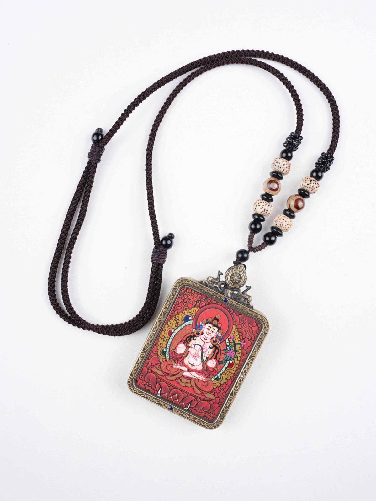 Tibetan Buddhist Thangka painting of Green Tara, hand-painted with natural mineral pigments on traditional canvas