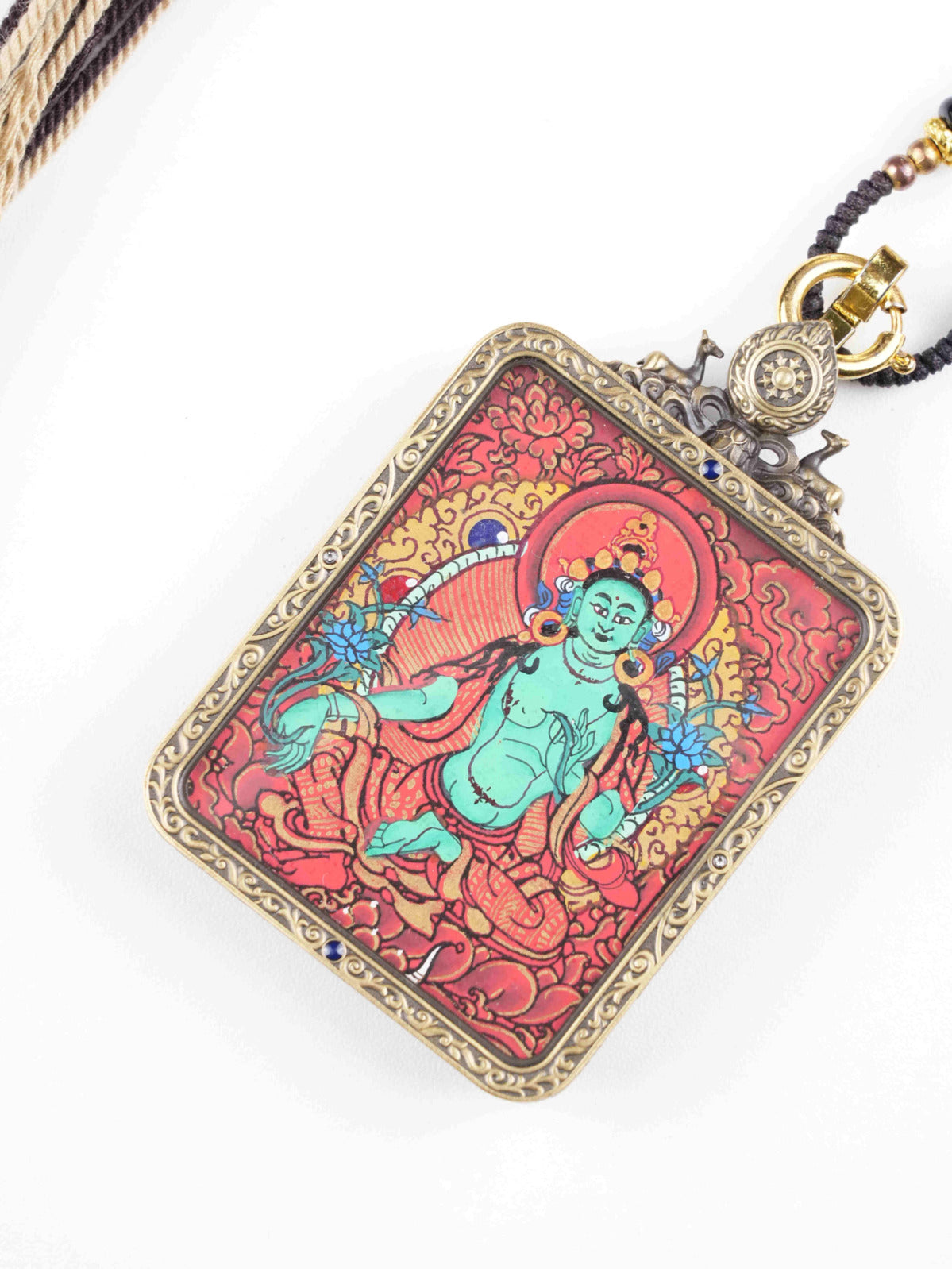 The Medicine Buddha thangka painting, believed to promote healing and wellbeing. This full hand-painted art on canvas is created with traditional natural mineral pigments.