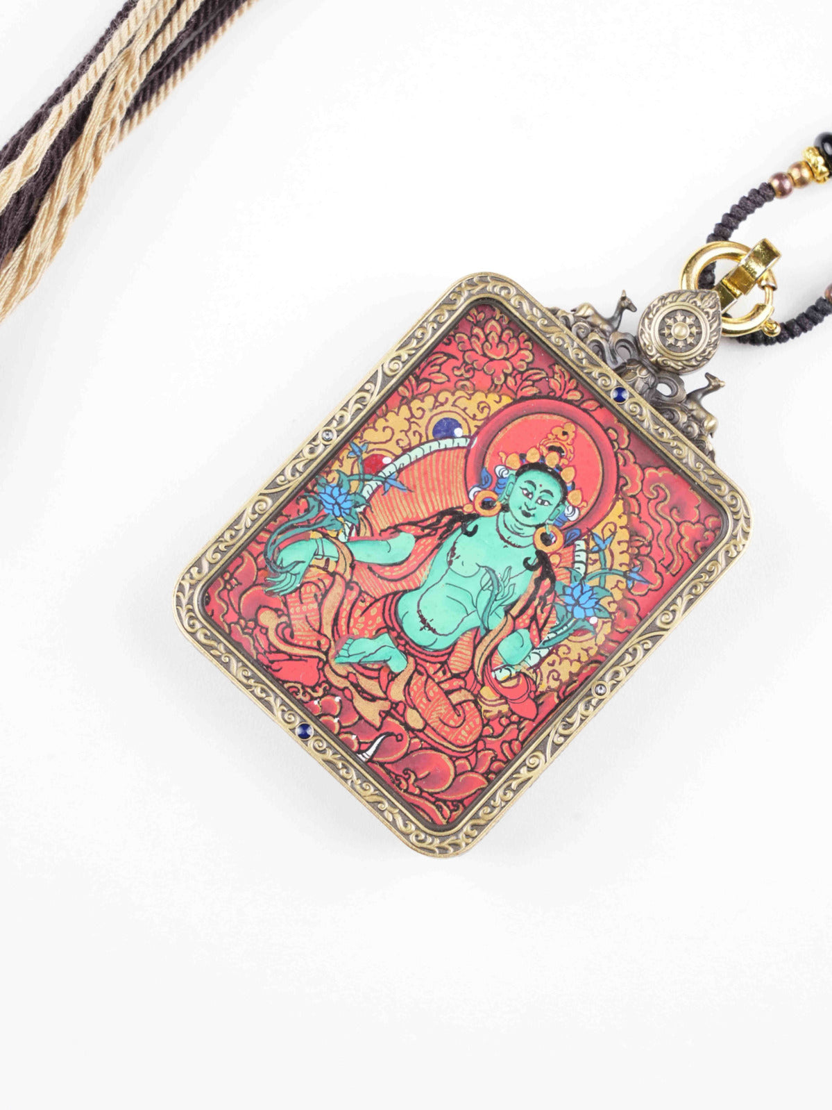 A detailed Tibetan Buddhist mandala in a full hand-painted thangka. This intricate design, painted with mineral colors on canvas, represents the universe and aids in spiritual