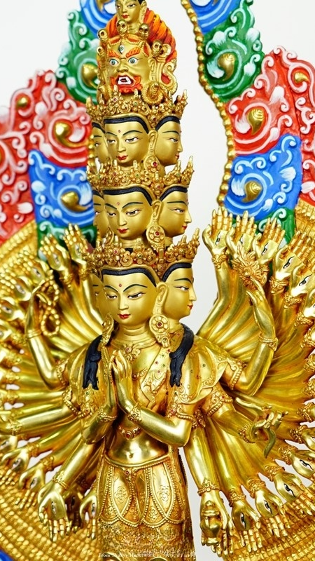 Hand-painted Tibetan-Buddhist Thousand-Arm Avalokiteshvara Buddha statue, using mineral pigments, representing compassion and deep spiritual symbolism in Buddhist sculpture.