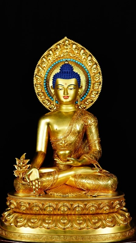 A handcrafted trio of Tibetan Buddhist Buddha statues, gilded with mineral paint, offering a perfect blend of spirituality and art.