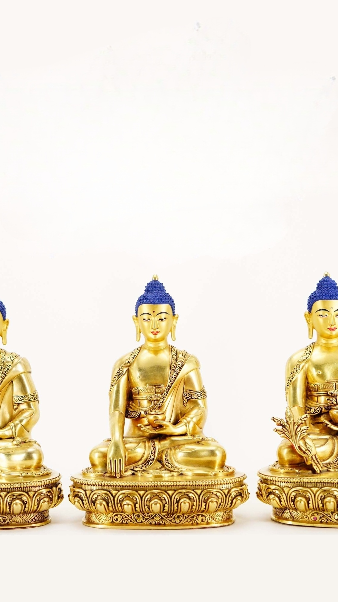 Alt Text: Gilded Tibetan Buddhist Three Buddhas statue, meticulously handcrafted, symbolizing eternal wisdom, peace, and the interconnectedness of all beings.