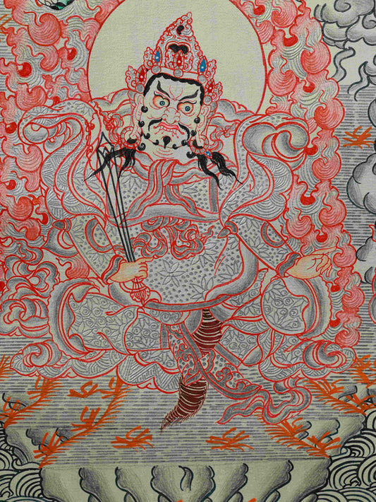 Tibetan Buddhist Yellow Dzambhala Thangka Painting with Silver Foil – sacred art representing abundance and fortune.