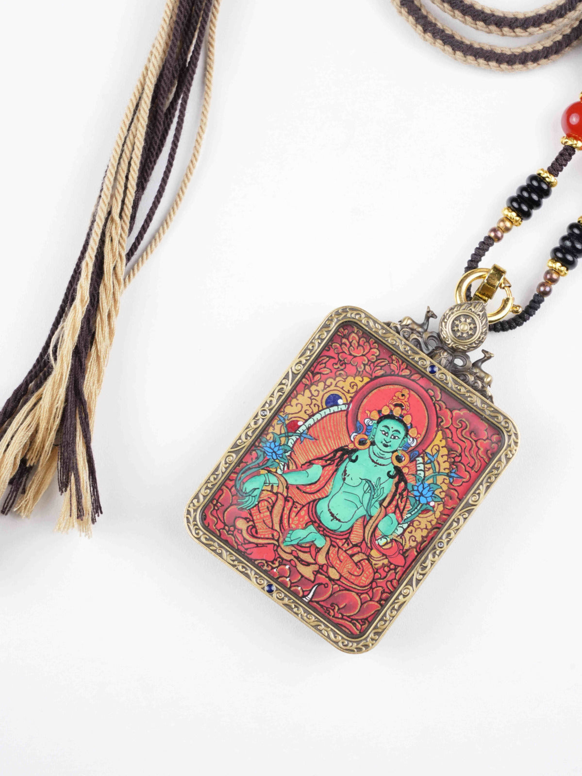 Authentic, full hand-painted Green Tara thangka painting. The Goddess of Compassion is depicted in vivid mineral colors on traditional canvas, offering protection and success.