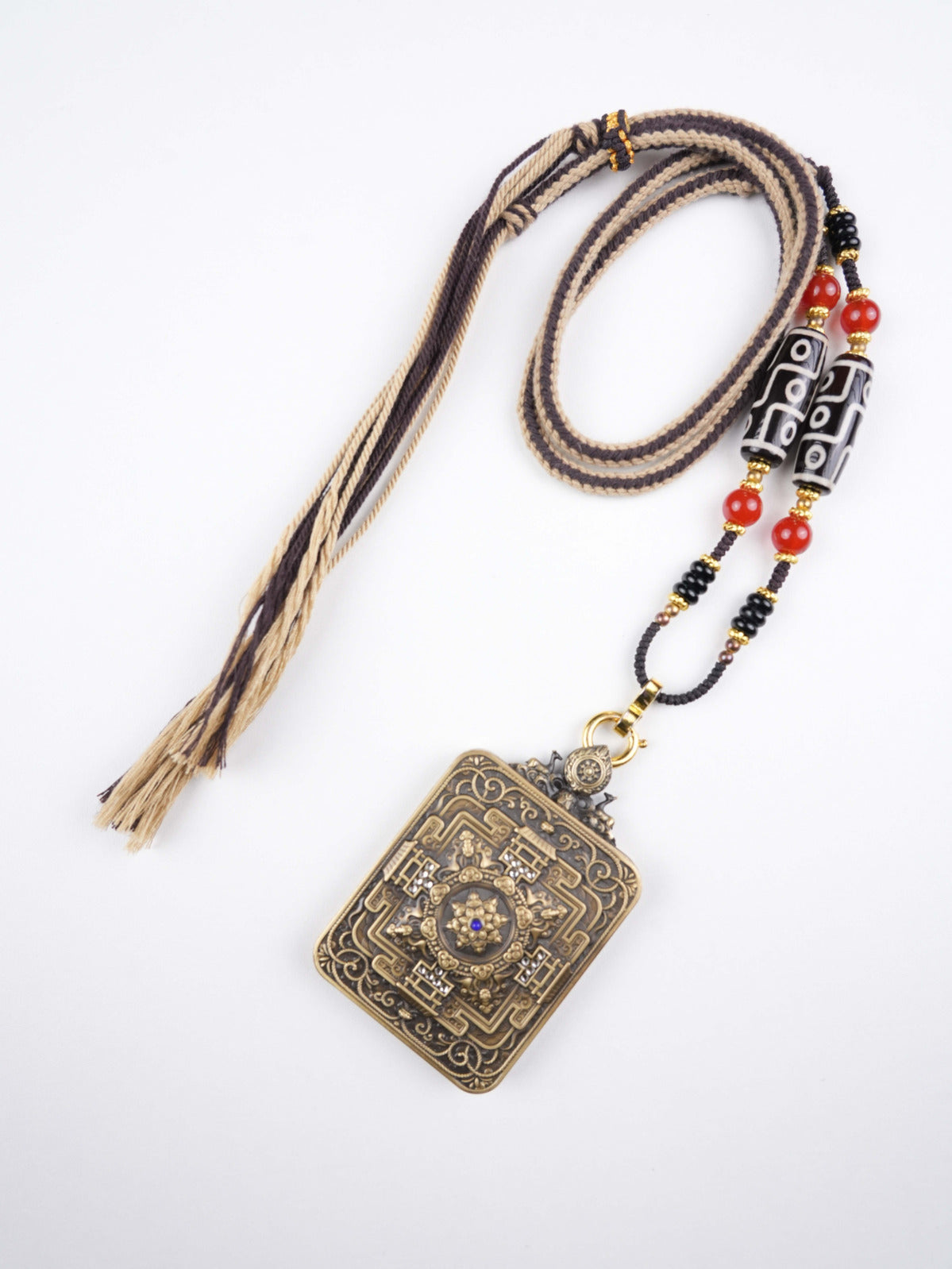 Thangka painting of Manjushri, the Bodhisattva of Wisdom, wielding a flaming sword. Hand-painted with natural mineral pigments to illuminate the path to enlightenment.