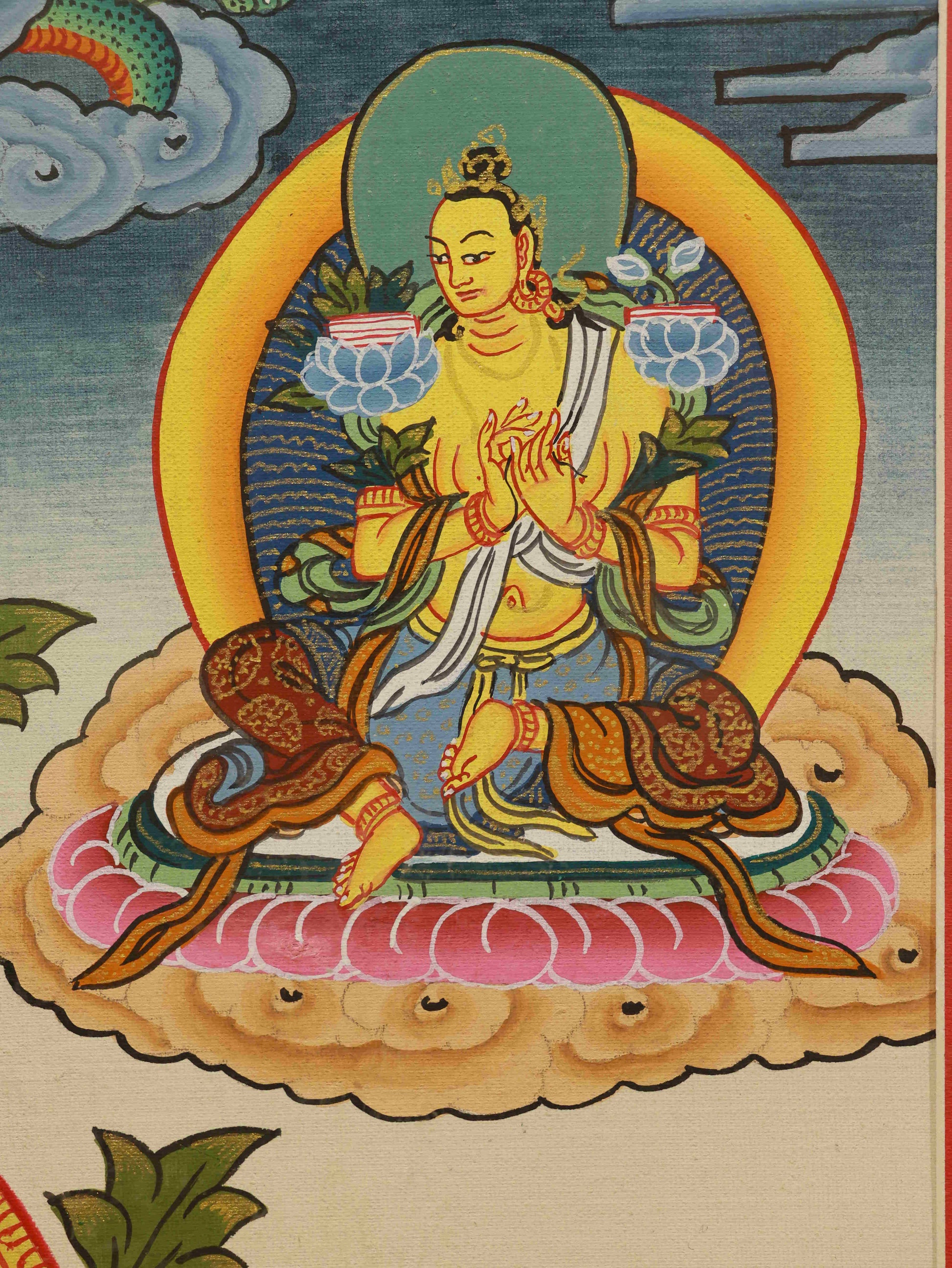 Traditional Tibetan Buddha art Yellow Jambhala Thangka with rich mineral pigments, symbolizing blessings of fortune and prosperity.