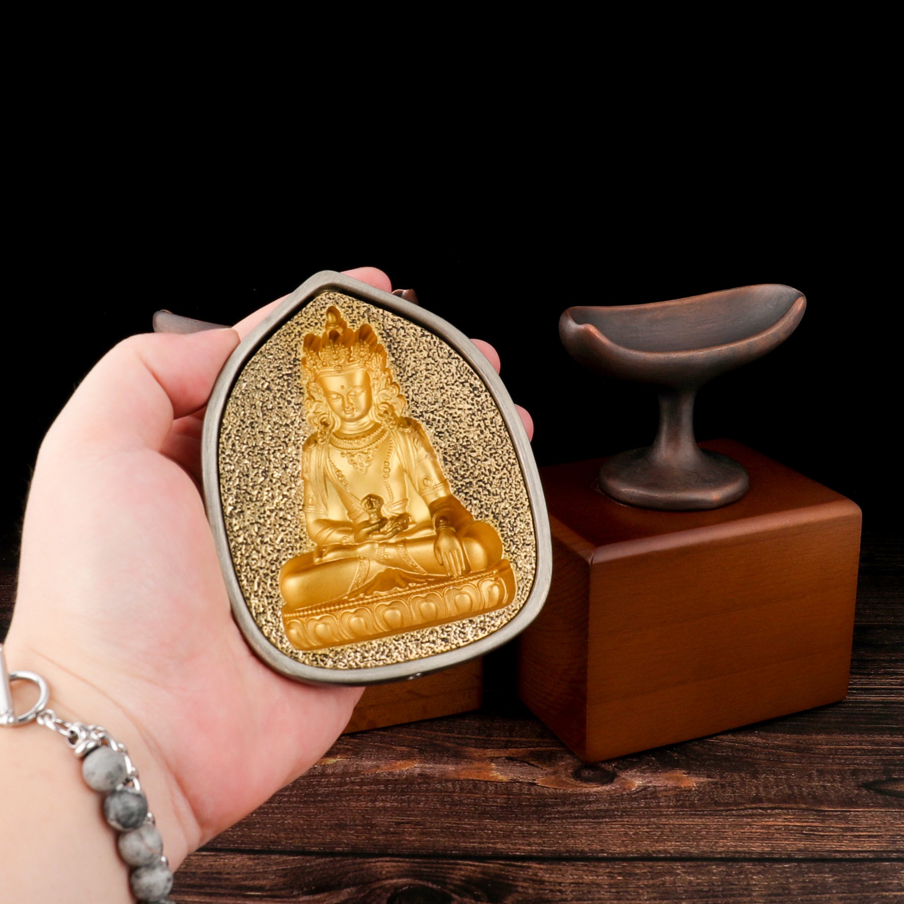 Handmade tsatsa mold statue in brass and purple copper.