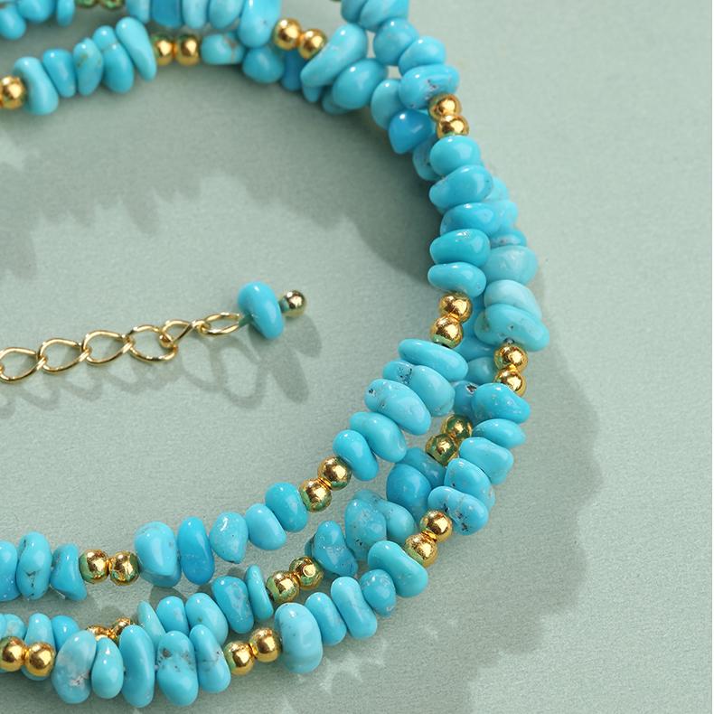 Tibetan turquoise necklace promoting harmony, protection, and mindfulness.
