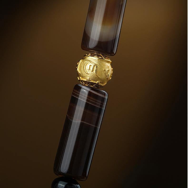 Unique handcrafted Tibetan Buddhist Two-Eyed Dzi Necklace, ideal for energy alignment and clarity.