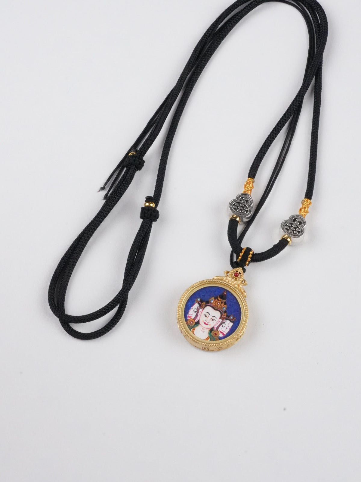 Usnisavijaya thangka pendant with mineral pigments - authentic craftsmanship for longevity and wisdom