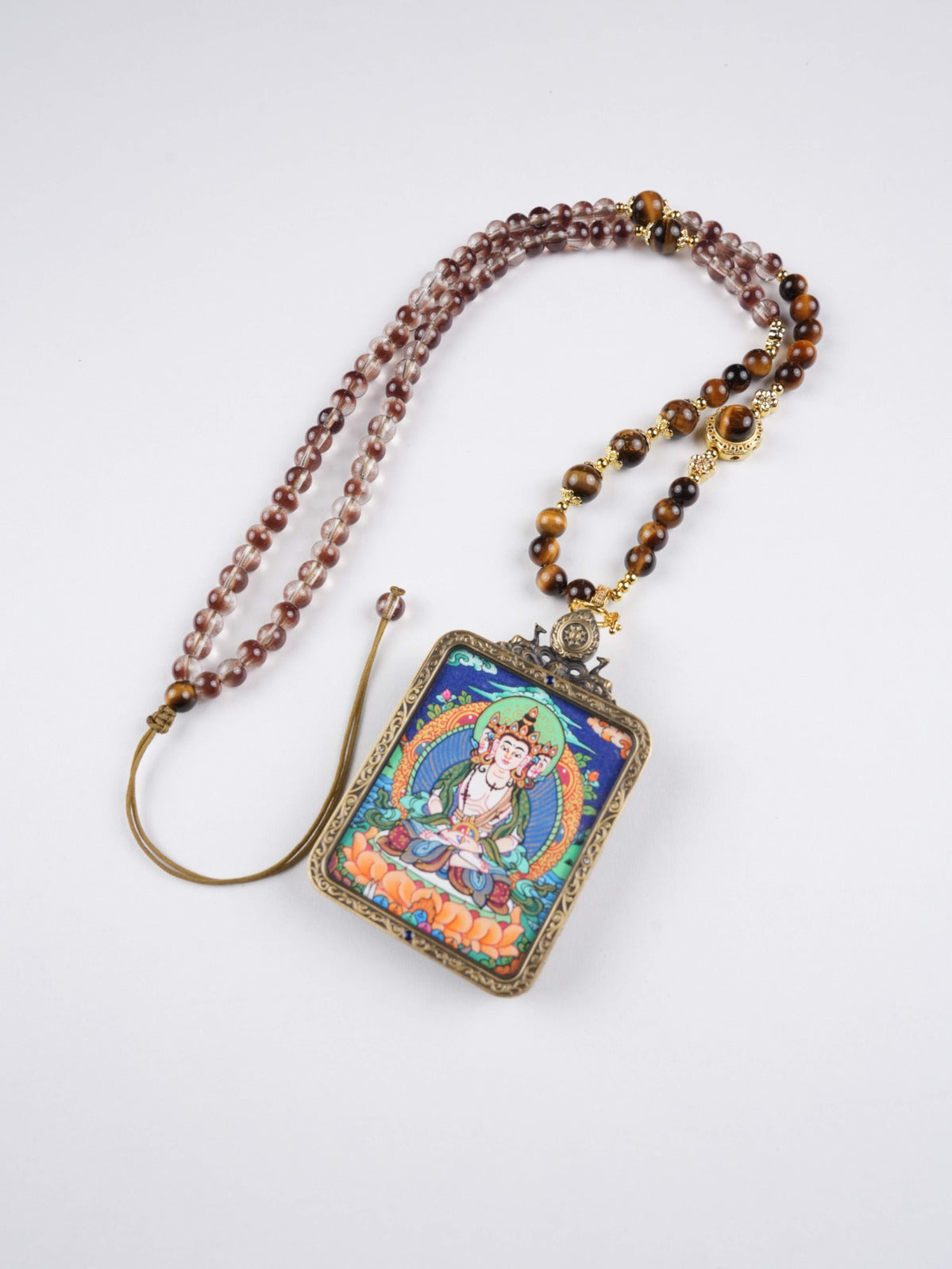 Portable Tibetan Thangka of Vairocana for wisdom, purification, and enlightened energy.