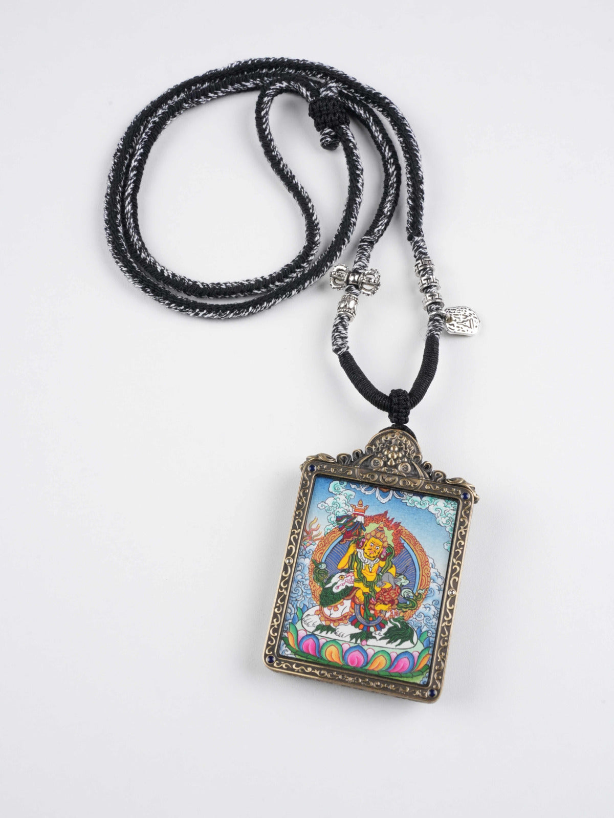 Vaishravana thangka pendant with natural mineral pigments - authentic hand-painted craftsmanship
