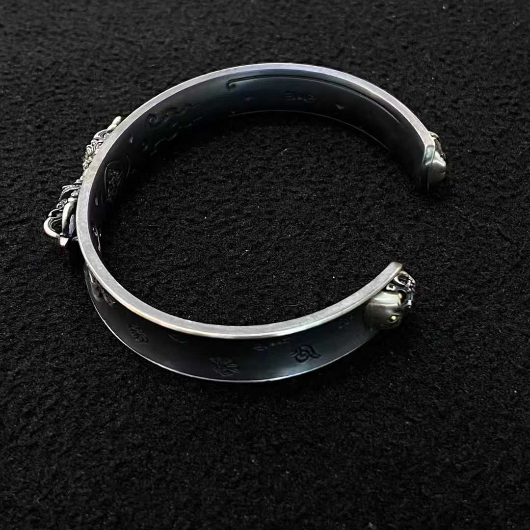 Artisan-made gold and silver Vajra bangle with precision inlay inspired by Tibetan spiritual jewelry.