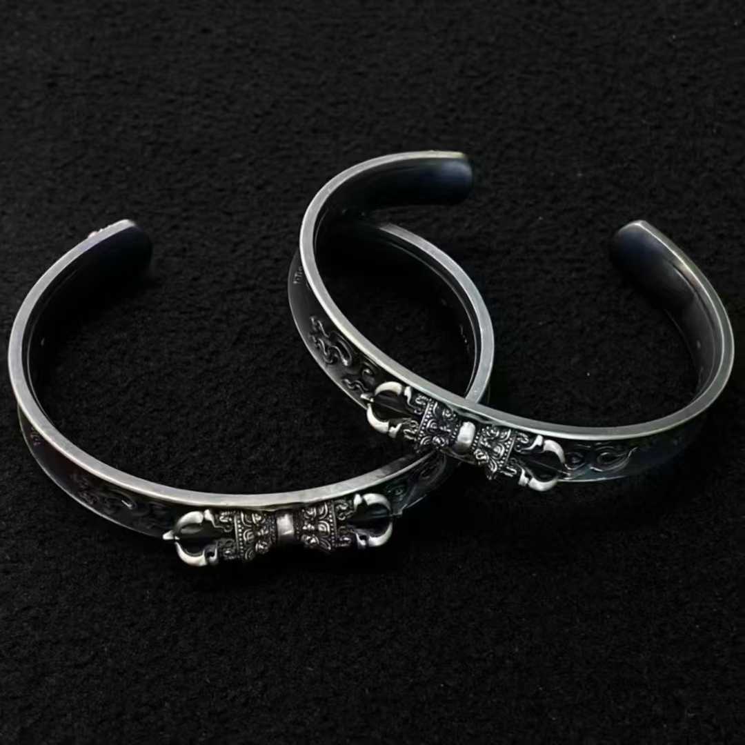 Pure gold and silver handcrafted Vajra bracelet reflecting traditional Tibetan Buddhist art.